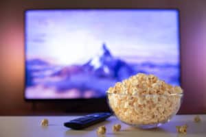 Movie screen and clear popcorn bowl