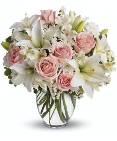 This beautiful bouquet will most certainly arrive in style! Ready for the runway, as it were. A delightful combination of light colors and lovely flowers, it's simply beautiful.
