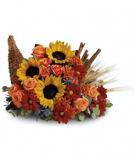 Along with joy, this cornucopia carries an abundance of beautiful fall flowers and foliage. A stunning centerpiece or inviting entryway display, this beauty will be at home anywhere in the house.